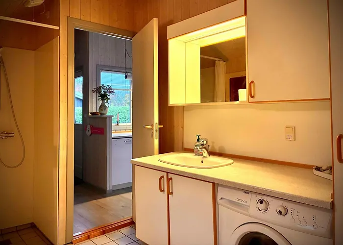 Lovely Family In Quiet Waterside Setting