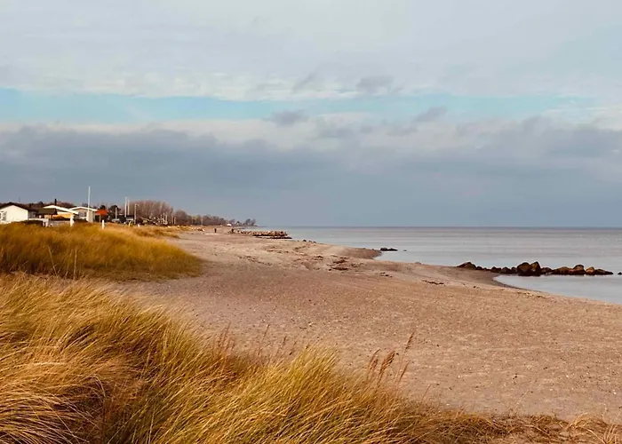 Lovely Family In Quiet Waterside Setting